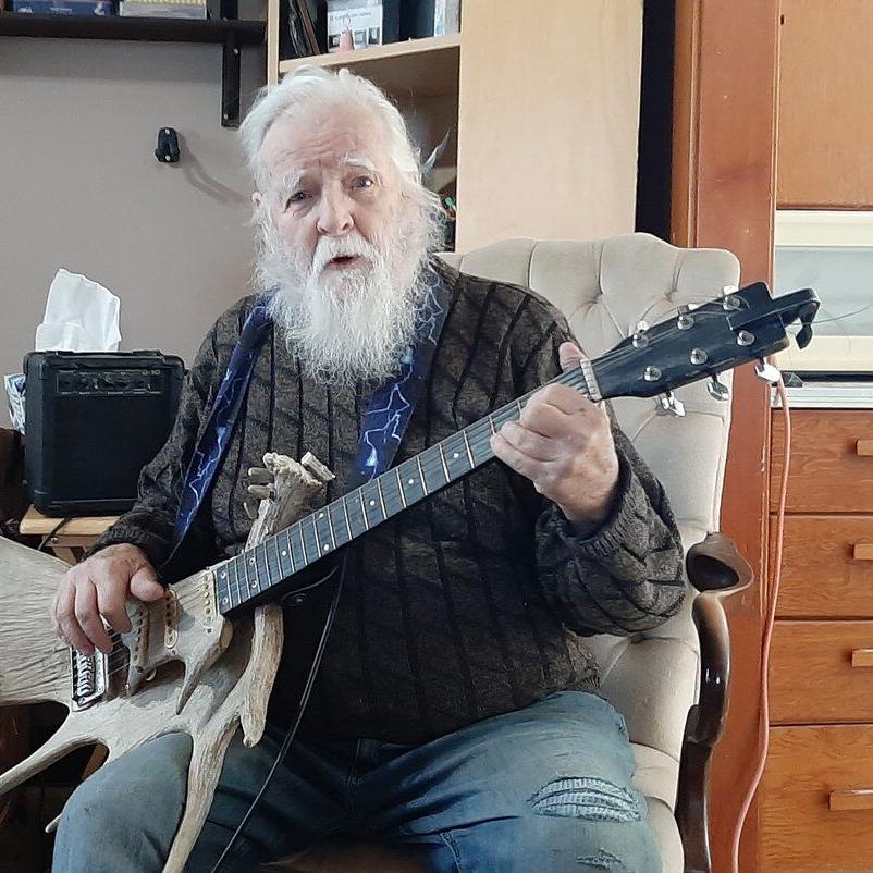 Music maker, 88, creates unique horn section, with moose antler bass guitar and cello